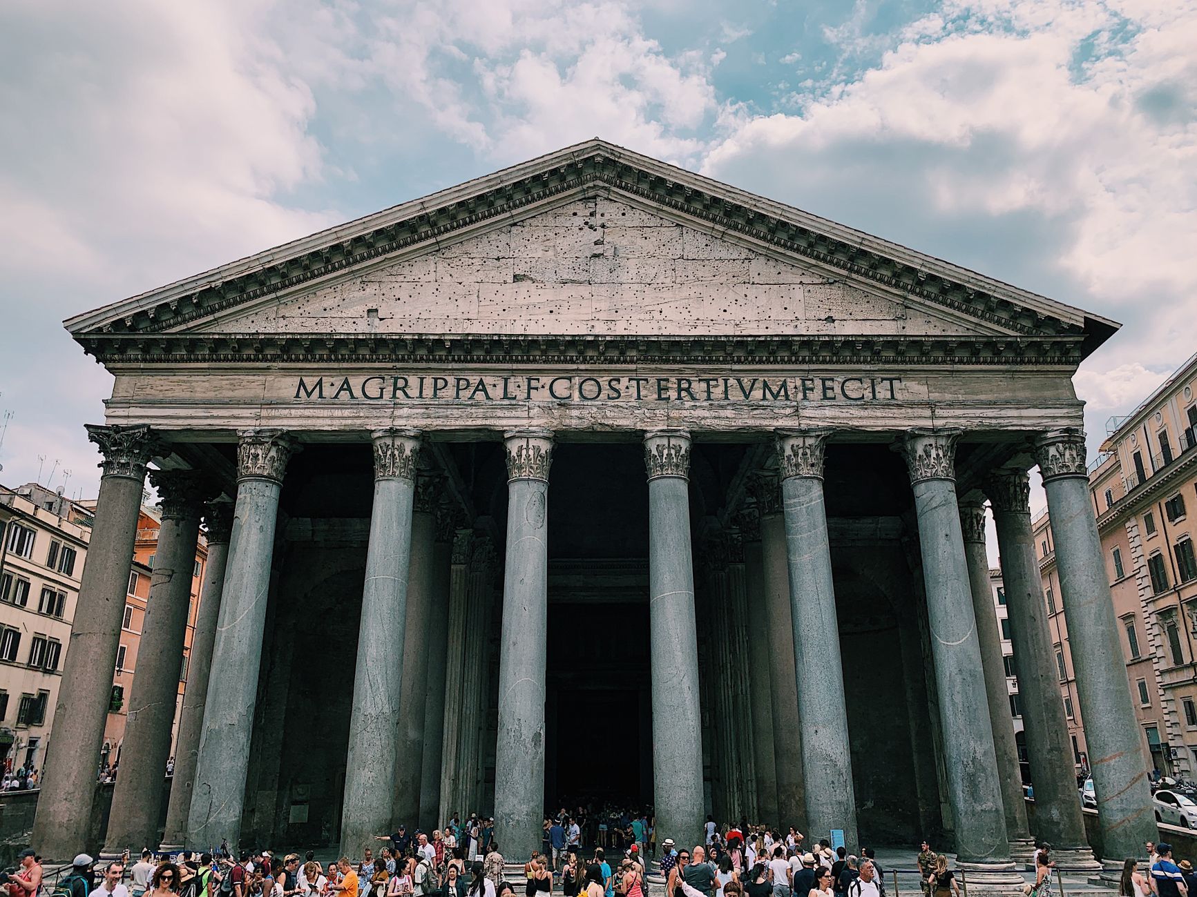 Pantheon facade under a cloudy sky